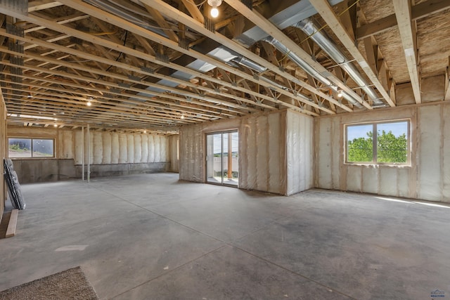3053 Hoefer Ave, Rapid City, SD 57701 - misc room featuring healthy amount of natural light and unfinished concrete floors