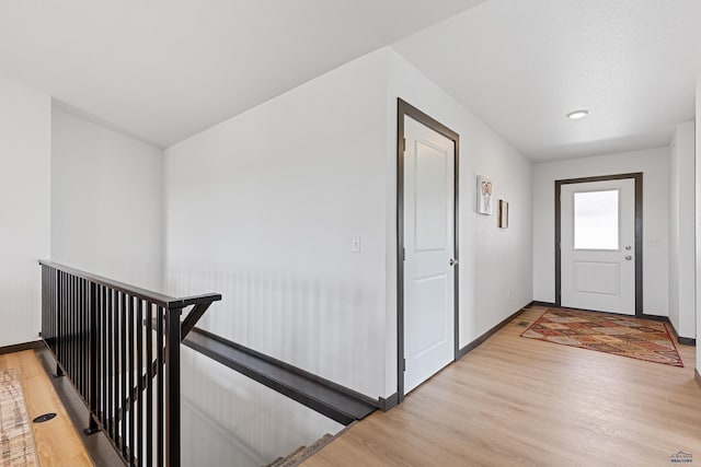 3053 Hoefer Ave, Rapid City, SD 57701 - foyer entrance with light wood-type flooring and baseboards