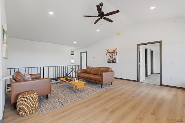 3051 Hoefer Ave, Rapid City, SD 57701 - living room featuring a ceiling fan, vaulted ceiling, light wood finished floors, recessed lighting, and baseboards