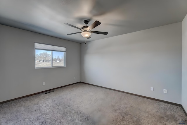 3553 Blackpowder Rd, Rapid City, SD 57703 - empty room with baseboards, a ceiling fan, and carpet