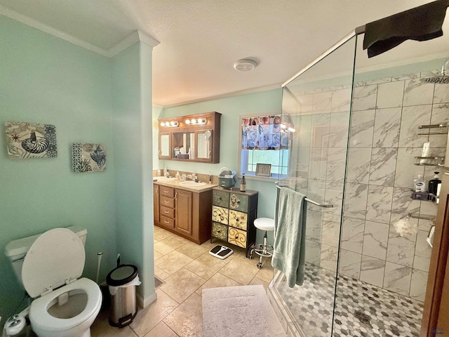 1222 Foothill Dr, Spearfish, SD 57783 - full bathroom featuring ornamental molding, walk in shower, vanity, toilet, and tile patterned flooring