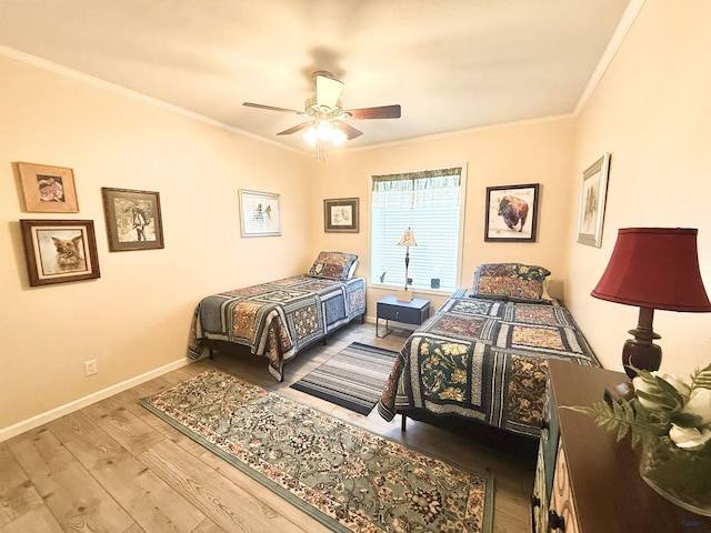 1222 Foothill Dr, Spearfish, SD 57783 - bedroom with ornamental molding, wood finished floors, baseboards, and a ceiling fan