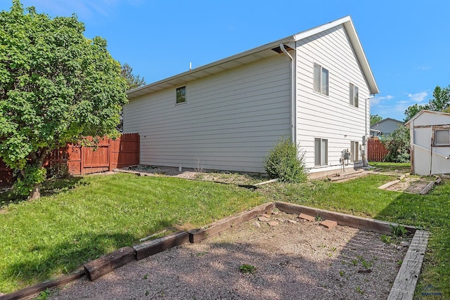 2198 Old Farm Ct, Rapid City, SD 57703 - rear view of property featuring a garden