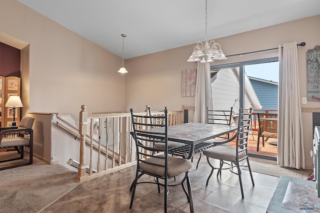 2198 Old Farm Ct, Rapid City, SD 57703 - dining room featuring a chandelier, vaulted ceiling, and baseboards