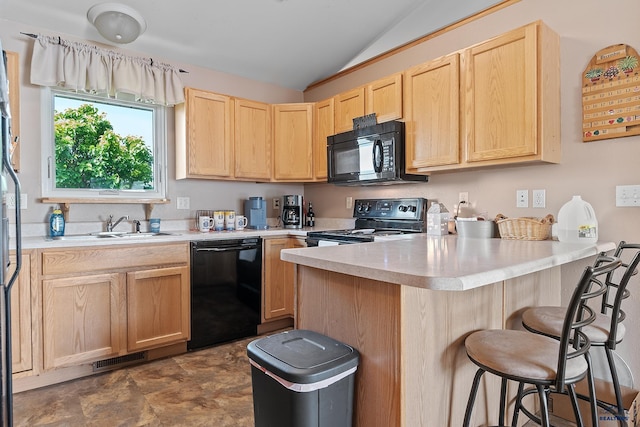 2198 Old Farm Ct, Rapid City, SD 57703 - kitchen featuring black appliances, light brown cabinetry, a peninsula, lofted ceiling, and a sink