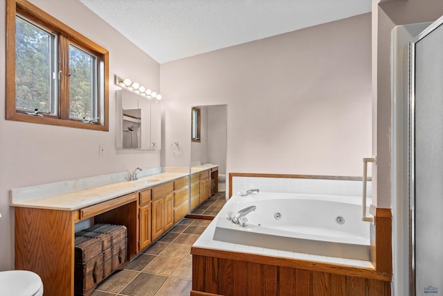 13741 Chipmunk Pl, Rapid City, SD 57702 - bathroom with toilet, vanity, a whirlpool tub, an enclosed shower, and tile patterned flooring