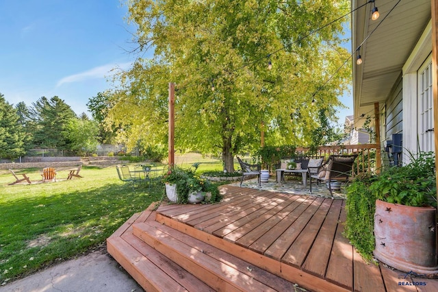 3112 Flint Dr, Rapid City, SD 57702 - deck with a lawn and a fire pit