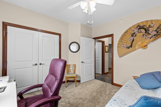 4035 Fairway Hills Dr, Rapid City, SD 57702 - carpeted bedroom featuring baseboards, a closet, and a ceiling fan