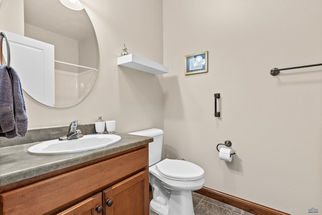 4035 Fairway Hills Dr, Rapid City, SD 57702 - bathroom featuring vanity, toilet, tile patterned floors, a shower, and baseboards