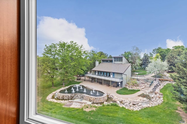 4035 Fairway Hills Dr, Rapid City, SD 57702 - rear view of property featuring a patio, a wooden deck, and a lawn