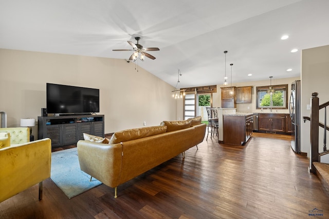 10145 Laramie Ln, Summerset, SD 57718 - living area featuring dark wood-type flooring, lofted ceiling, a ceiling fan, recessed lighting, and stairs
