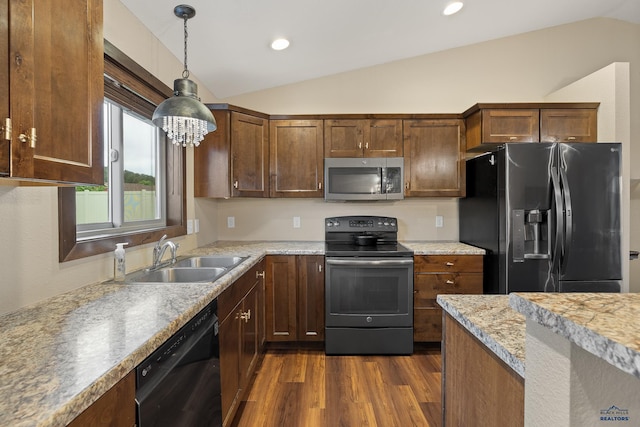 10145 Laramie Ln, Summerset, SD 57718 - kitchen with black appliances, a sink, vaulted ceiling, dark wood-style flooring, and light countertops