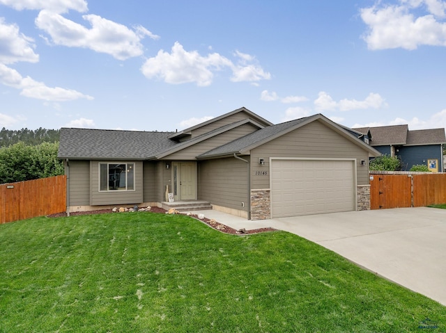 10145 Laramie Ln, Summerset, SD 57718 - single story home with an attached garage, driveway, and a shingled roof