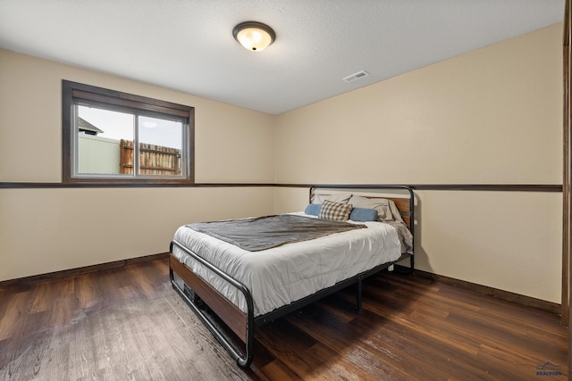 10145 Laramie Ln, Summerset, SD 57718 - bedroom featuring baseboards and wood finished floors