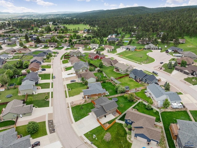 10145 Laramie Ln, Summerset, SD 57718 - aerial view of property's location with nearby suburban area and a heavily wooded area