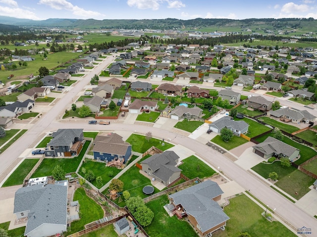 10145 Laramie Ln, Summerset, SD 57718 - aerial view of property and surrounding area featuring nearby suburban area and a mountain backdrop