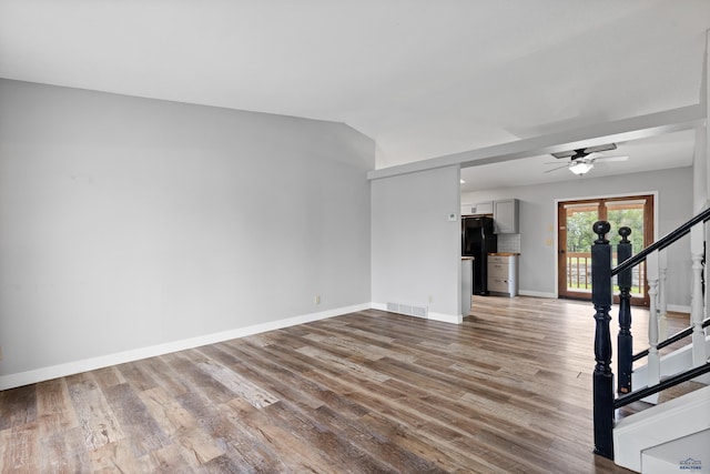1705 Copperdale Dr, Rapid City, SD 57703 - unfurnished room with wood finished floors, stairs, baseboards, and ceiling fan