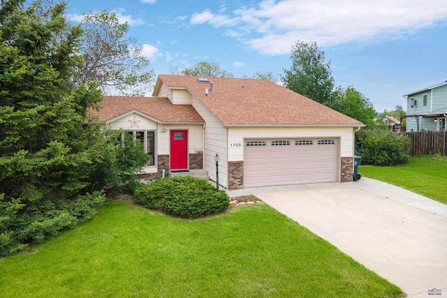 1705 Copperdale Dr, Rapid City, SD 57703 - view of front of home with driveway, a garage, and a shingled roof