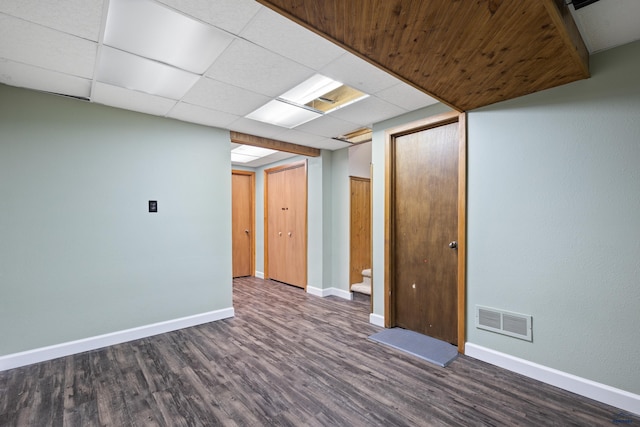 1705 Copperdale Dr, Rapid City, SD 57703 - finished basement featuring wood finished floors, baseboards, and a paneled ceiling