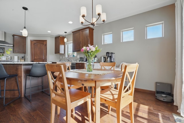 4528 Lahinch St, Rapid City, SD 57702 - dining space featuring dark wood-style flooring, healthy amount of natural light, recessed lighting, and a chandelier