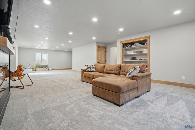 4528 Lahinch St, Rapid City, SD 57702 - living room with light carpet, recessed lighting, and baseboards