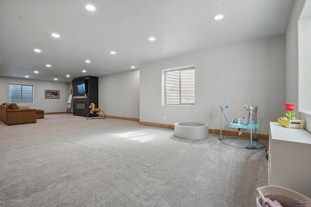 4528 Lahinch St, Rapid City, SD 57702 - rec room with carpet floors, baseboards, and recessed lighting