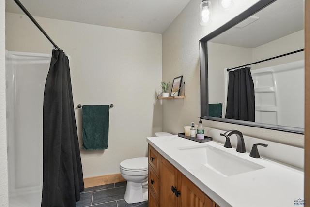 4528 Lahinch St, Rapid City, SD 57702 - full bath with toilet, a shower with curtain, vanity, and tile patterned floors