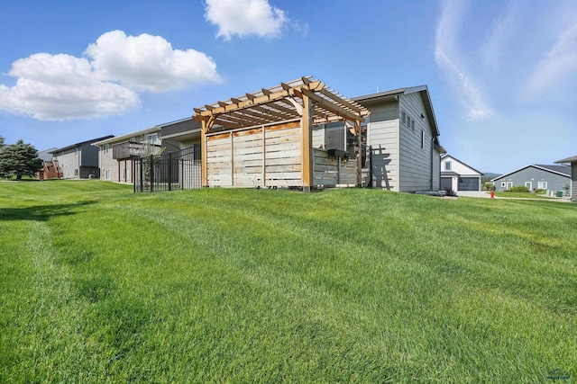 4528 Lahinch St, Rapid City, SD 57702 - rear view of property featuring a yard and a pergola