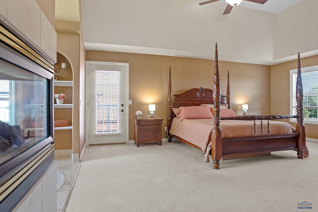 1120 S Regency Ct, Rapid City, SD 57702 - bedroom featuring access to outside, baseboards, light carpet, and ceiling fan