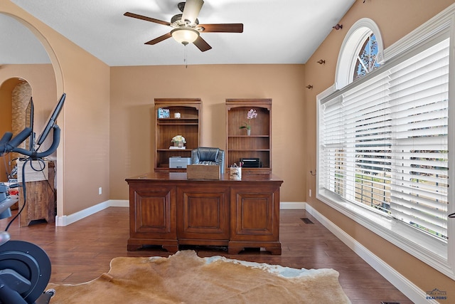 1120 S Regency Ct, Rapid City, SD 57702 - home office with a ceiling fan, wood finished floors, and baseboards