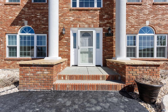 1120 S Regency Ct, Rapid City, SD 57702 - view of exterior entry featuring brick siding