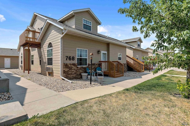 768 Earleen St Unit F, Rapid City, SD 57701 - view of front of property with a front yard