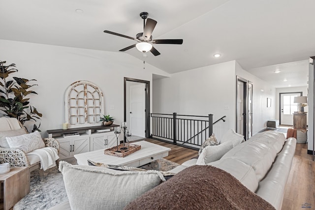 1246 Pinnacle Ct, Rapid City, SD 57701 - living area with vaulted ceiling, a ceiling fan, wood finished floors, and recessed lighting