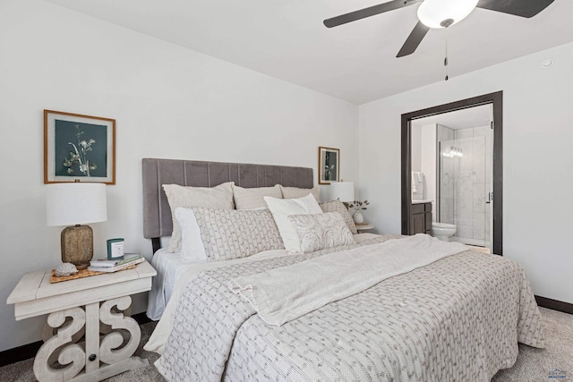 1246 Pinnacle Ct, Rapid City, SD 57701 - bedroom with carpet flooring, baseboards, ensuite bath, and ceiling fan