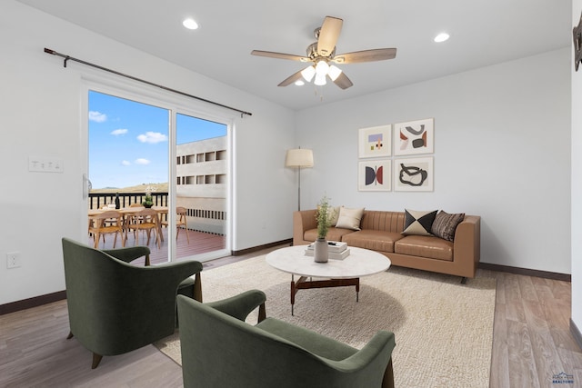1740 Harmony Heights Ln, Rapid City, SD 57702 - living area with ceiling fan, radiator, light wood-style floors, baseboards, and recessed lighting