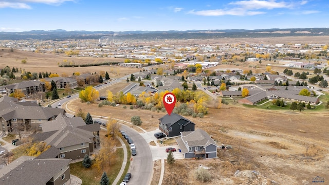 1740 Harmony Heights Ln, Rapid City, SD 57702 - aerial view of property and surrounding area with nearby suburban area and a mountainous background
