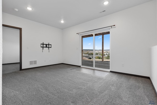 1740 Harmony Heights Ln, Rapid City, SD 57702 - unfurnished room with carpet floors, baseboards, recessed lighting, and a smoke detector