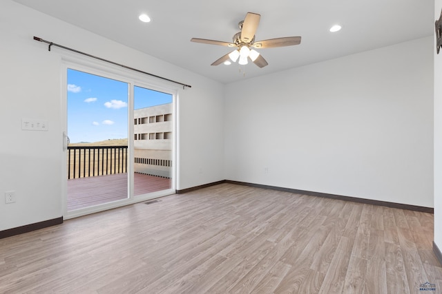 1740 Harmony Heights Ln, Rapid City, SD 57702 - unfurnished room with light wood-style floors, a ceiling fan, baseboards, and recessed lighting
