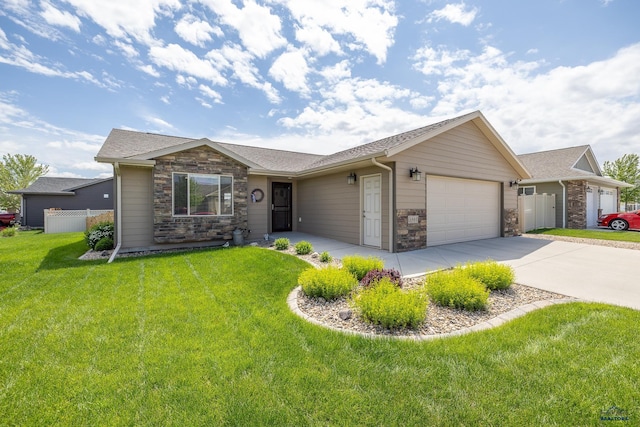 3511 Jerusalem Blvd, Rapid City, SD 57703 - ranch-style home featuring stone siding, an attached garage, concrete driveway, and roof with shingles