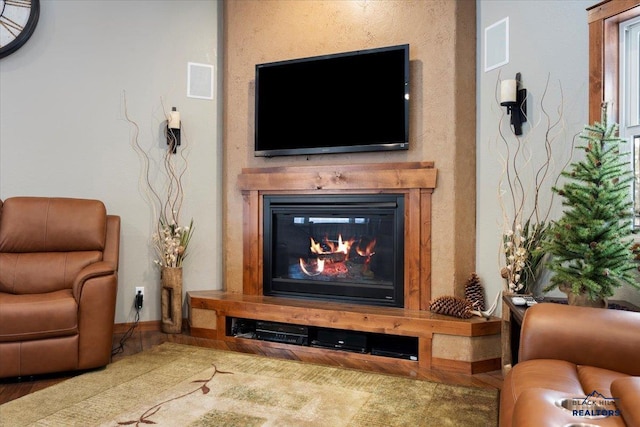 11916 Aspen View Rd, Sturgis, SD 57785 - living area with a glass covered fireplace