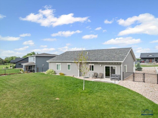 3781 W Beartooth Loop, Spearfish, SD 57783 - back of property featuring a gazebo, a patio area, a gate, and a shingled roof