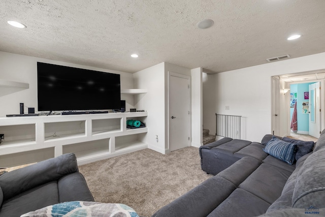 2909 Hoefer Ave, Rapid City, SD 57701 - carpeted living area with a textured ceiling and recessed lighting