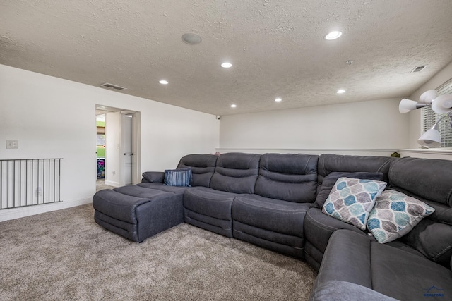 2909 Hoefer Ave, Rapid City, SD 57701 - carpeted living area with a textured ceiling and recessed lighting