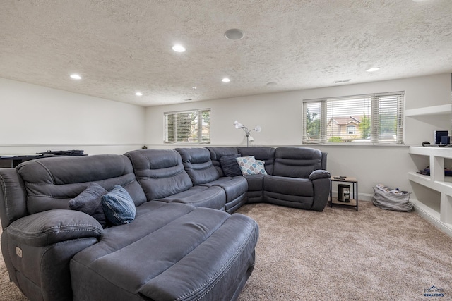 2909 Hoefer Ave, Rapid City, SD 57701 - carpeted living area featuring recessed lighting and a textured ceiling
