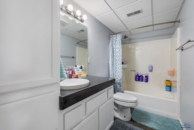 2909 Hoefer Ave, Rapid City, SD 57701 - bathroom with vanity, shower / tub combo with curtain, and a paneled ceiling
