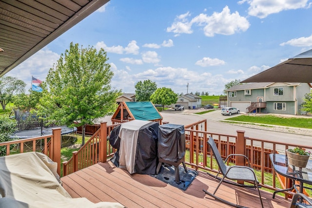 2909 Hoefer Ave, Rapid City, SD 57701 - wooden deck featuring a trampoline