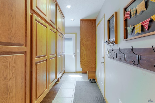 4941 Springtree Ct, Rapid City, SD 57702 - hall featuring recessed lighting and light tile patterned floors