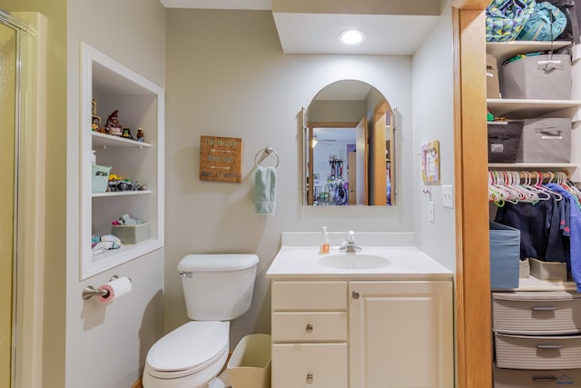 4941 Springtree Ct, Rapid City, SD 57702 - bathroom with vanity, a shower with shower door, and built in shelves