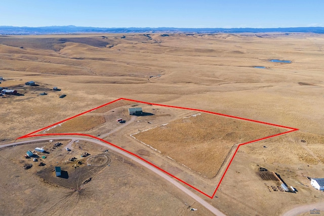 22219 Saddle Rd, Piedmont, SD 57769 - overview of rural landscape featuring property parcel outlined and a mountain backdrop