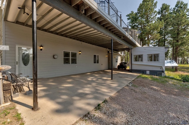 12525 Jax Ct, Rapid City, SD 57701 - view of patio featuring an attached carport